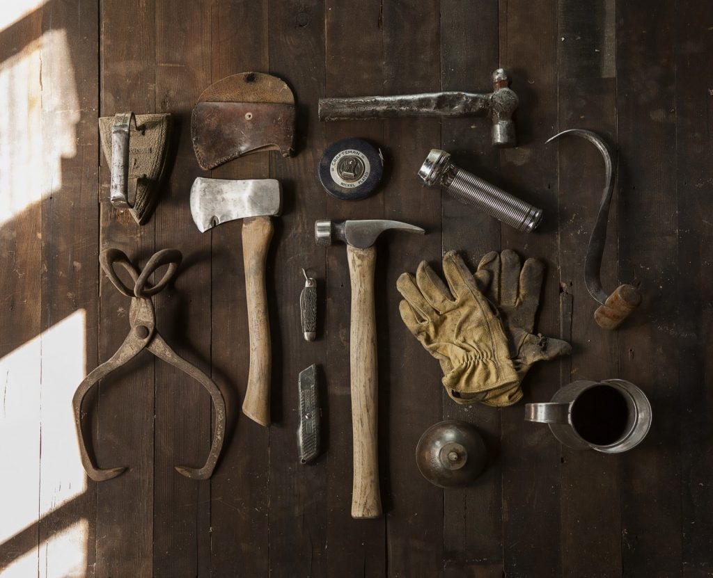 aerial-view-of-carpenters-tools-on-wooden-table